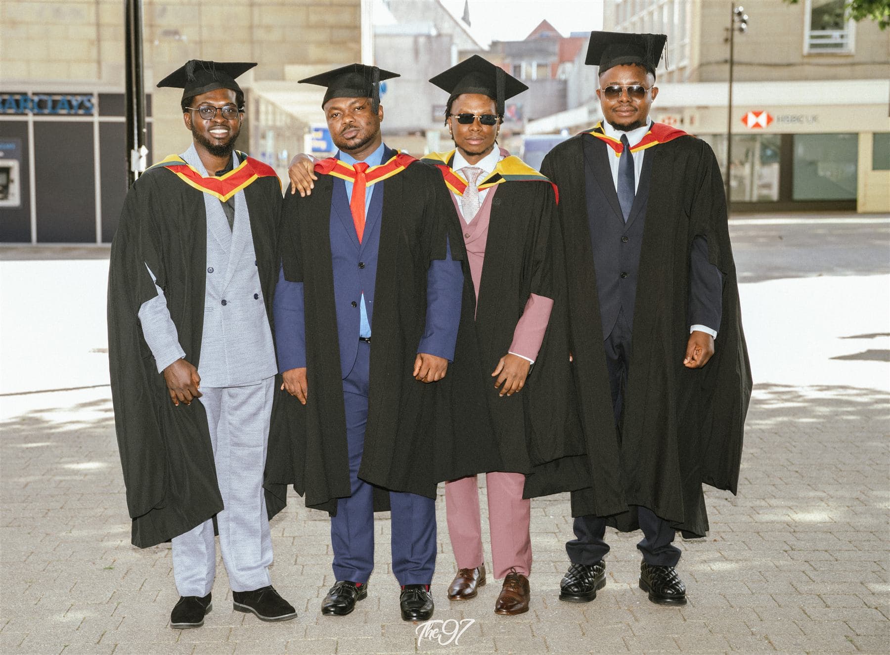 Àlọbọ̀ Travels students in graduation gowns after completing their studies abroad